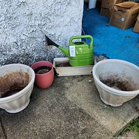 All planters and watering can together