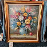 Full view of framed floral painting