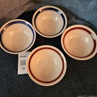 four bowls top view showing color stripes