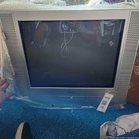 Front view of Toshiba CRT TV with built-in DVD player and integrated speakers