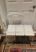 Front view of transfer bench showing three-panel seat with ruler indicating 30 in width