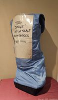 Blue Woods carry bag labeled Two 'Single' Inflatable Mattresses