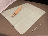 Silicone pastry mat with rolling pin displayed