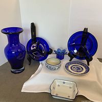 Group shot showing all blue and white dishes and vase