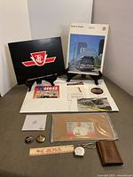 Group shot of all TTC memorabilia items arranged on table