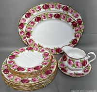 Full set showing plates, platters, jug and underplate