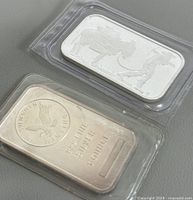 Two encapsulated silver bars, Sunshine Mining and SilverTowne