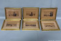 Six gold-tone framed etchings displayed front view