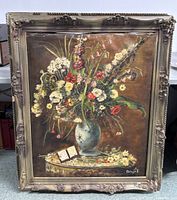 Full view of framed floral oil painting
