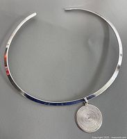 Full view of sterling collar with pendant attached