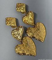 Front view showing hammered gold-tone hearts and square tops