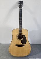 Front view of Fender F-65 acoustic guitar