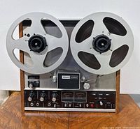 Front view of TEAC A-3300 recorder with two metal reels mounted