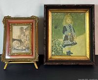 Both framed prints side by side