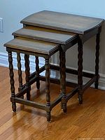 All three nesting tables stacked showing graduated sizes
