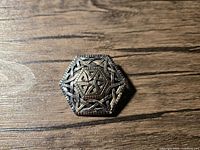 Front view showing hexagonal Celtic knot design