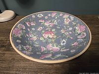 Top view of porcelain bowl showing Famille Rose decoration