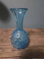 Front view of aqua blue hobnail vase showing full profile