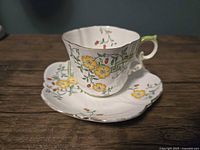 cup and saucer front view showing floral pattern