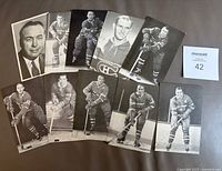 All ten postcards laid out on surface