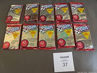 All ten sealed Soccer Shots 1991 Premier Edition packs displayed