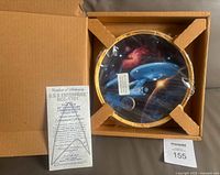 Plate in original box with COA visible