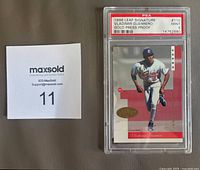 Front of PSA-slabbed Guerrero card with gold press proof emblem and PSA label