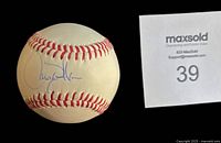 Autographed side of baseball with Larry Walker signature