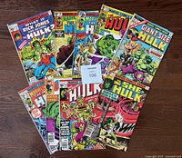 All 11 comics fanned out on floor showing mix of Giant-Size Hulk, She-Hulk and multiple Hulk issues