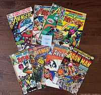 Eight comics laid out on floor showing full lot