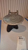Top view of pewter USS Enterprise on stand
