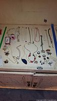 Overview of all jewellery laid out on surface