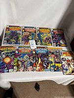 All nine Machine Man comics laid out