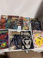 Tabletop shot of all visible comics