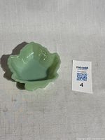 Top view of jadeite maple leaf dish with reference tag