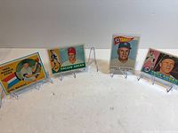 All four 1960 Topps baseball cards on stands