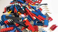 Pile of assorted Lego bricks, slopes, arches and specialty parts