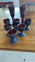 Full set of 6 goblets and 2 flutes on table