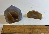 Both agate pieces with ruler for scale