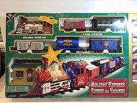 Front of box showing full train set contents and branding