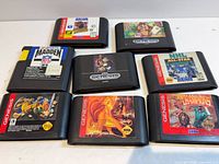 All eight Sega Genesis cartridges front view