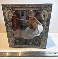 Front view of boxed set showing Gollum figure and DVD/book spine