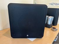 Front view of Boston Acoustics subwoofer with grille