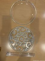 Both glass plates top view with ruler showing size