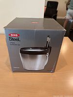 Retail box showing OXO SteeL 3-Piece Ice Bucket Set