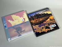 Both Canada Post Collection Canada yearbooks 1999 and 2002 in sleeves