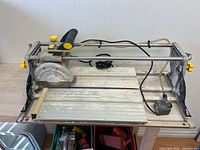 Overall view of Mastercraft TC 70400 wet tile saw on workbench