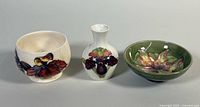 Group shot of the three Moorcroft pieces