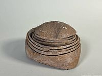 Stacked agate dishes inside original stone form