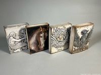 Front view of four Sid Dickens Memory Blocks